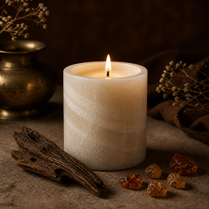 Bakhoor soy candle lit in a warm styled setting
